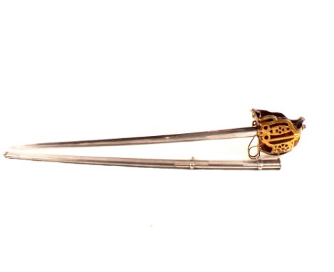 A brass hilted Scottish style decorative broadsword and scabbard