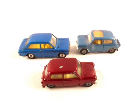 A Corgi 334 Mini Cooper, 226 Mini Minor with maroon body and lemon interior plus a 251 Hillman Imp with blue body
