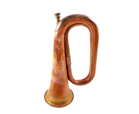 A copper and brass bugle marked Taylors Music Co (Pty) Ltd Capetown