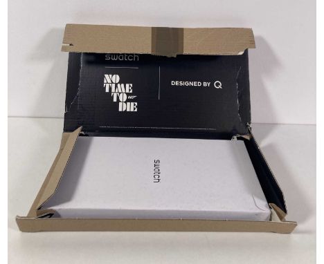 A boxed James Bond 'No Time To Die' Q watch by Swatch. In original packaging and box with mailing box. Excellent condition.