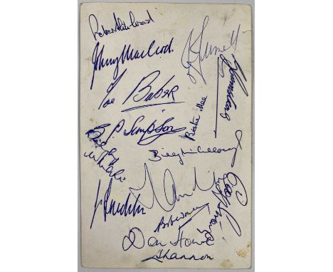 An original photograph of the Arsenal team of 1964 on the beach in South Africa (9 x 14cm) signed to reverse by 15 members of