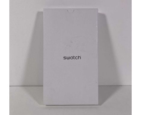 A boxed James Bond 'No Time To Die' Q watch by Swatch. In original packaging and box. Excellent condition.