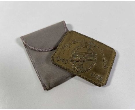 A belt buckle (makers Deane, Adams & Deane) issued to the cast and crew upon completion of 'The Eagle Has Landed' (1976). Mea