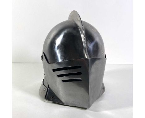 A replica helment, impressively crafted in steel, created from the original studio models to be an exact replica of the helme