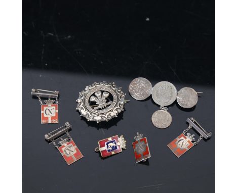 5 Georg Jensen silver and red enamel badges, a silver regimental badge, a coin brooch etc 