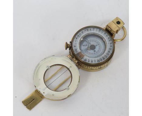 A Second World War Period mark III prismatic marching compass, by T G Co Ltd of London, with British Broad Arrow, dated 1944,