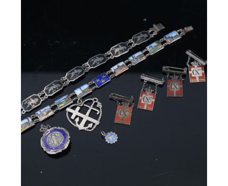 A silver and Niello panel bracelet, a silver and enamel panel bracelet, Georg Jensen badges etc 