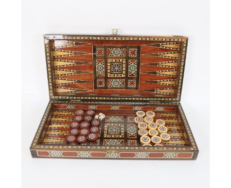 Vintage inlaid back gammon set, 40cm across 