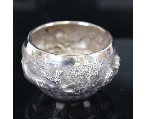 A Burmese silver bowl, with an embossed and engraved  hunting scene decoration, impressed T90, 5.6oz 