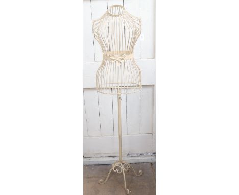 A painted wrought-metal mannequin on stand, height 144cm overall 