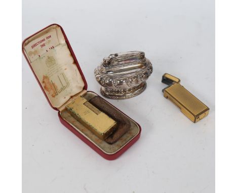 2 Dunhill gold plated gas lighters, and a Ronson Crown table lighter (3) 