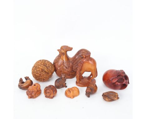 A group of reproduction Oriental miniature netsuke and masks 