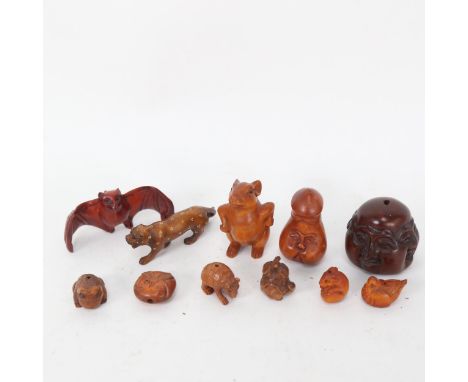 A group of modern carved wood miniature netsuke 