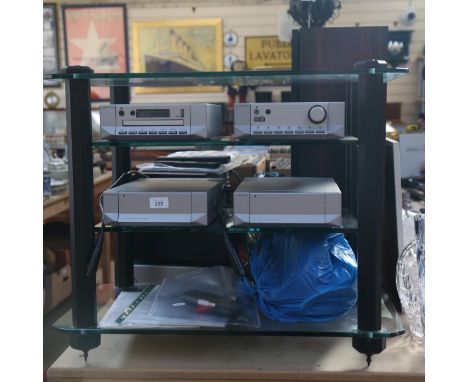 A Cyrus Hi-Fi system, comprising Cyrus 7 stereo integrated amplifier, Cyrus CD7 and 2 x PSX-R power supply units, 3-tier glas