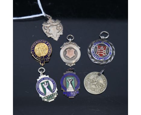 3 silver and enamel fobs, and 4 other badges 