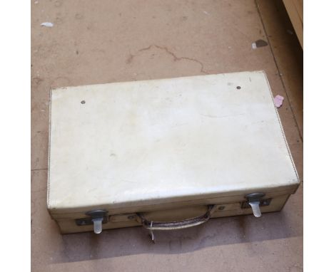A Vintage white leather suitcase 
