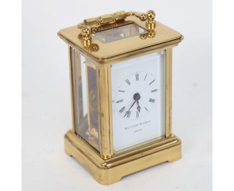 A Matthew Norman miniature brass-cased carriage clock, case height 8cm, not currently working 