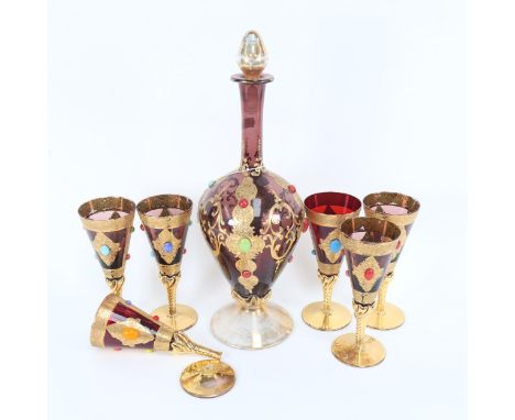 A Vintage ruby glass decanter and 5 glasses, with gilded and stone set decoration, decanter height 19cm 