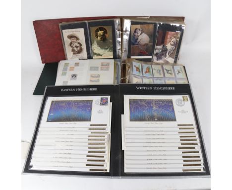 An album of mainly early 20th century dog related postcards, dog related cigarette cards, album of Millennium First Day Cover