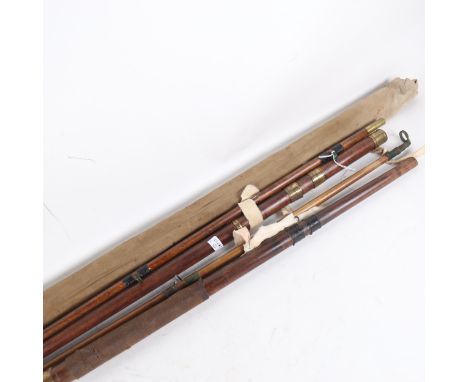 A bundle of Vintage cane fishing rods 