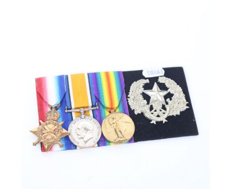 A group of First World War medals and badge, to 18274 Pte R B Mackie Scottish Rifles 