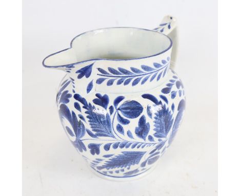An 18th century Worcester blue and white jug, height 17cm 