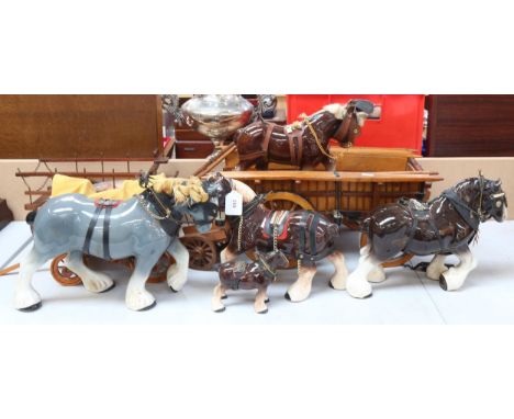A group of 5 ceramic Dray horses, and 4 various carts, longest 52cm 