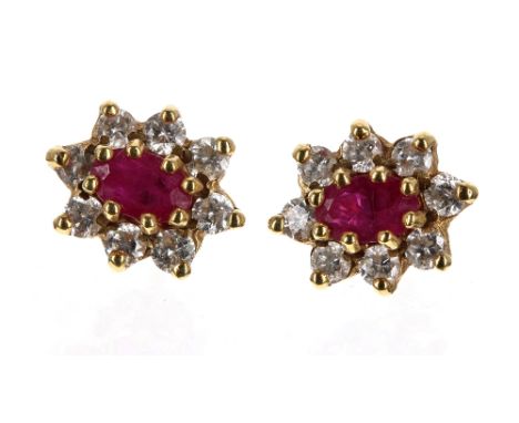 Pair of 18ct ruby and diamond cluster earrings, the rubies each 0.25ct approx, 1.6gm, 10mm x 8.5mm