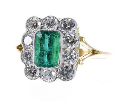 Good 18ct emerald and diamond cluster ring, the emerald 1.00ct, with ten round brilliant-cut diamonds, 1.00ct approx, clarity