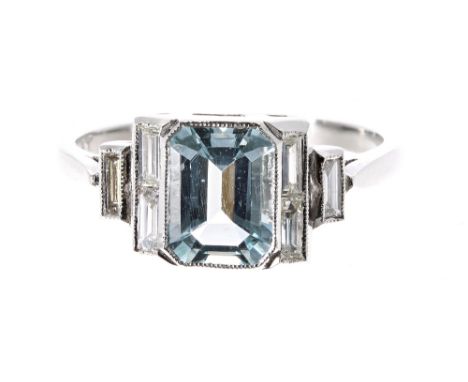 Art Deco style platinum aquamarine and diamond dress ring, the aquamarine 1.25ct, with stepped shoulders set with baguette-cu