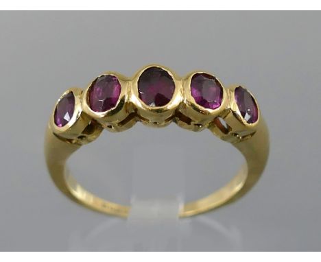 Attractive 18ct five stone amethyst ring, ring size O/P, 5.1gm