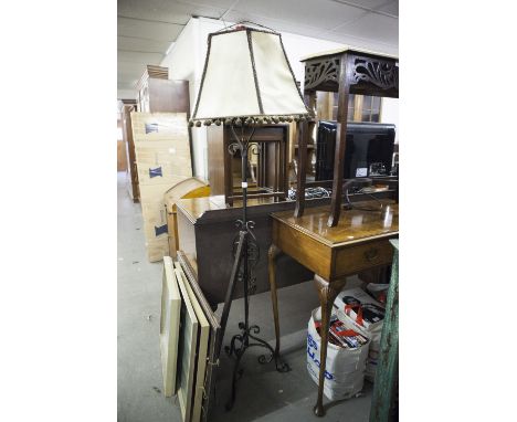 A BLACK WROUGHT IRON STANDARD LAMP 