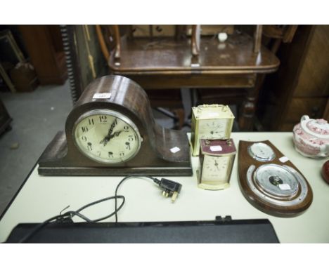 A JAMES WALKER CLOCK, TWO CARRIAGE CLOCKS AND A BAROMETER (4) 