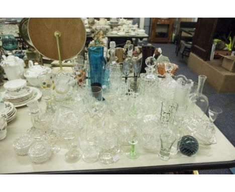 CUT AND MOULDED GLASS, including, six piece blue glass water set, pale blue paperweight wih bubble inclusions, four decanters