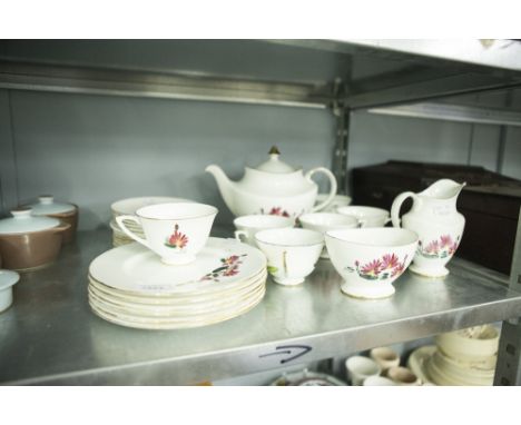WHITE CHINA TEA AND DESSERT SERVICE, HAND PAINTED WITH WATER LILIES, FOR 6 PERSONS, 27 PIECES, VIZ OVAL TEAPOT, SUGAR BASIN A