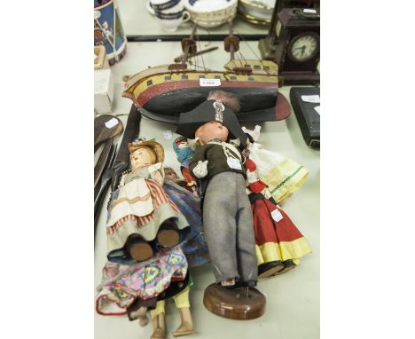 A WOODEN MODEL GALLEON AND VARIOUS COSTUME DOLLS 