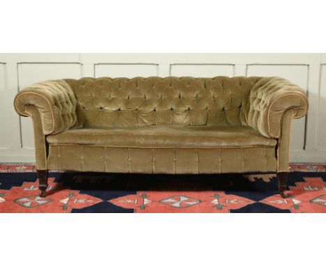A VICTORIAN MAHOGANY AND BUTTON VELVET UPHOLSTERED CHESTERFIELD SOFA LATE 19TH CENTURY 70cm high, 190cm wide, 95cm deepProven