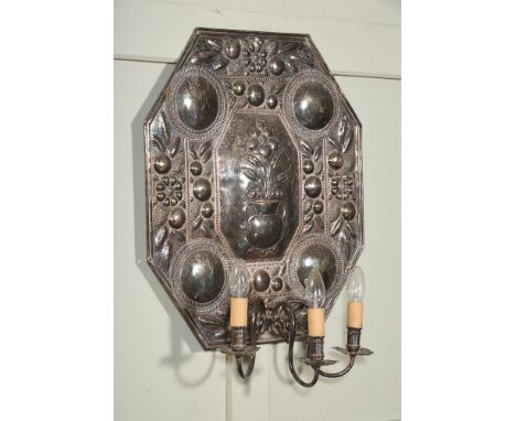 A SILVER PLATED EMBOSSED THREE LIGHT WALL APPLIQUE  20TH CENTURY  backplate 58cm x 49cmProvenance: Private Collection, Fawley