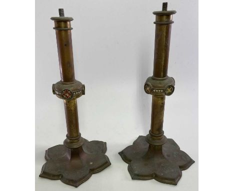 VICTORIAN BRASS GOTHIC STYLE CANDLESTICKS, A PAIR - lacking screw on sconces, lacquered brass with central enamel type detail