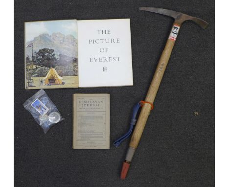 A Himalayan Journal (1954), first report of the Everest ascent, a Pictorial Guide of Everest (1954), a pedometer, a map measu