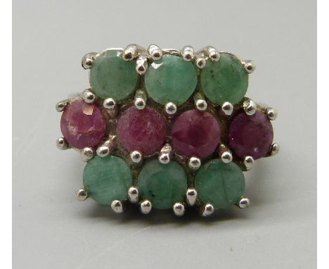 A silver, emerald and ruby ring, N 