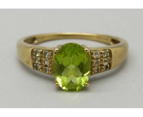 A 9ct gold, peridot and diamond ring, 2.4g, O 