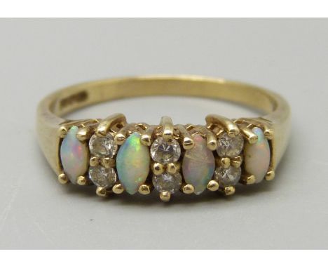 A 9ct gold, opal and CZ ring, 1.9g, N 