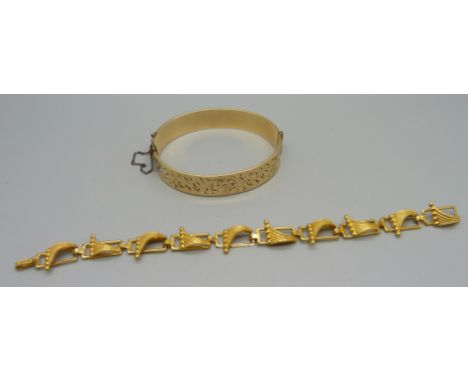A 9ct rolled gold bangle and a 14ct gold plated bracelet 