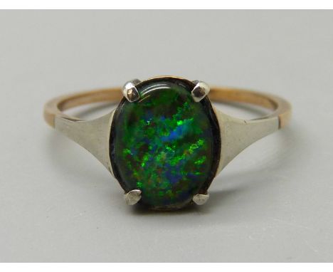 A 9ct gold and black opal doublet ring, 1.5g, O 