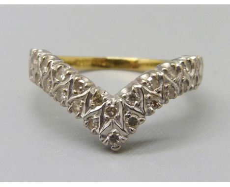 An 18ct gold and diamond wishbone ring, 3.4g, R, mark worn 