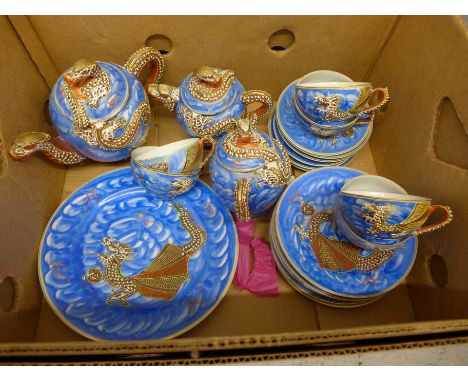 An oriental dragon six setting tea service **PLEASE NOTE THIS LOT IS NOT ELIGIBLE FOR POSTING AND PACKING** 