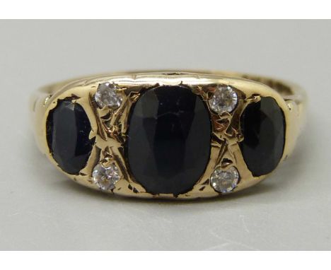 A 9ct gold, sapphire and white zircon ring, 2.4g, N 