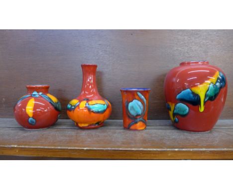 Four Poole vases, tallest 15.5cm 