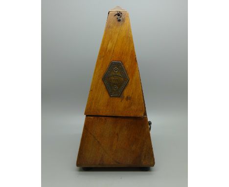 A Maelzel metronome, cover chipped 